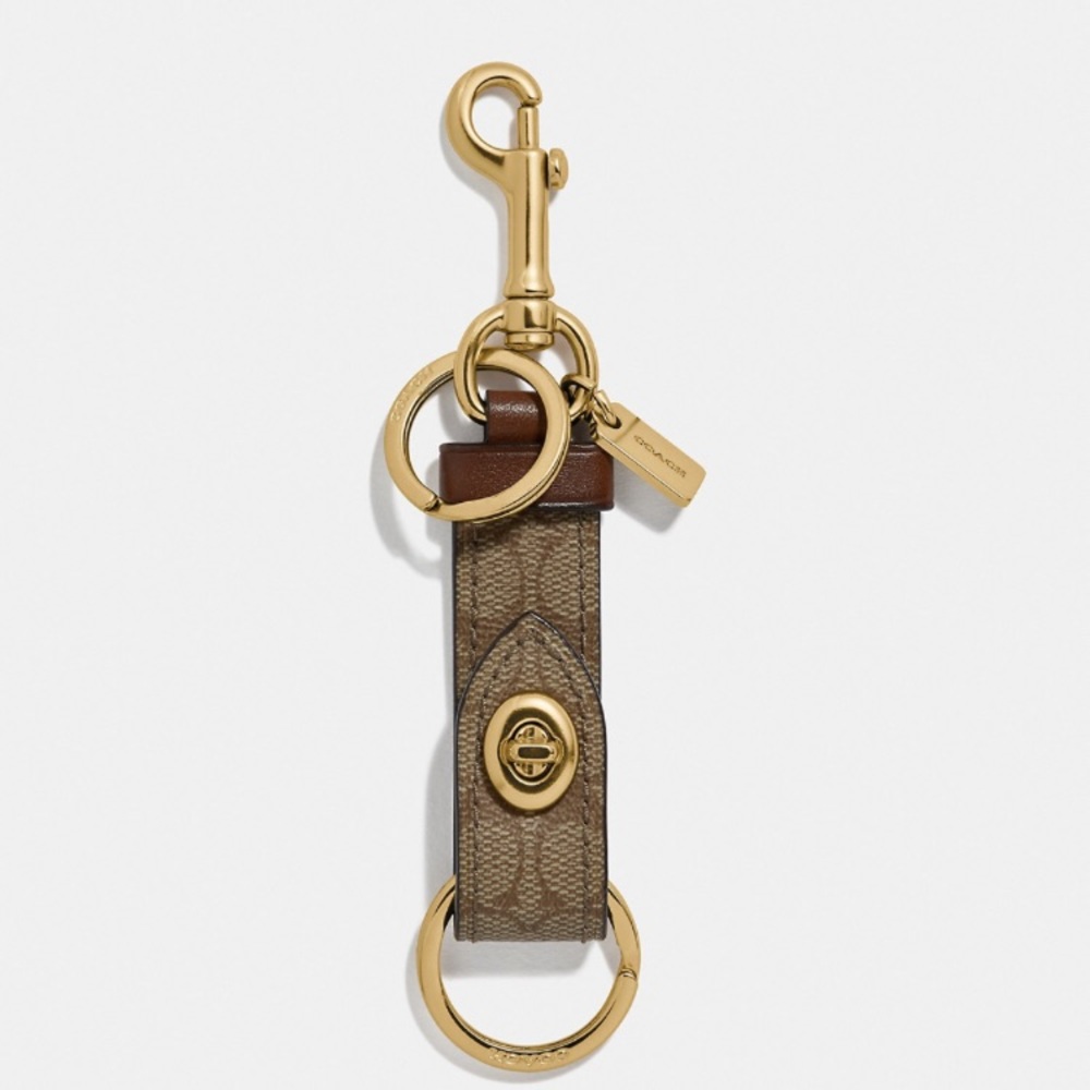 Coach Trigger Snap Bag Charm In Signature Canvas